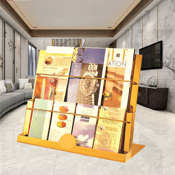 Mẫu kệ chứa tạp chí làm từ inox mạ vàng