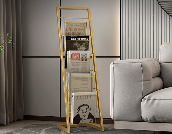Mẫu kệ để sách bằng inox mạ vàng đặt ở sát tường đúng chuẩn